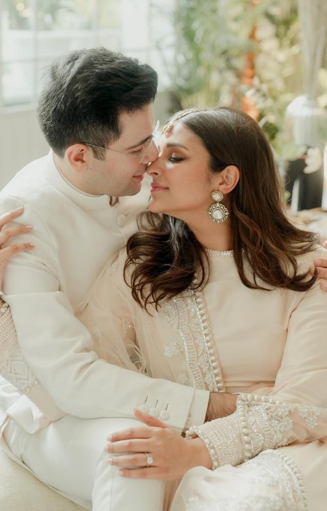 At her engagement with Raghav Chadha, the actress wore an ivory-coloured attire with minimum jewellery